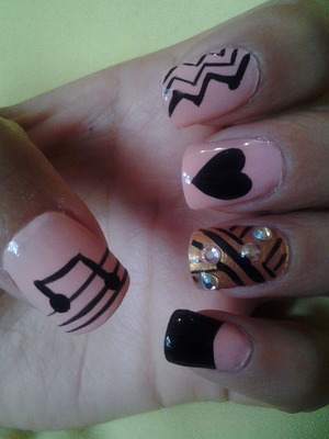 Pink nails and blacks designs