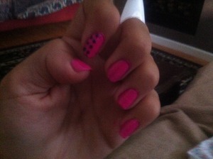 I was bored so this is what happened!  I just did all pink nails with purple spots on one accent nail