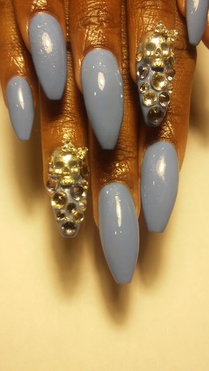 blue skull nails with jewels