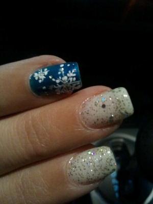  White sparkle with blue accents snowflakes. Shellac design