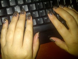 Sparkley Zebra print using Sephora's Nail Bling stickers in "Horizontal Zebra".