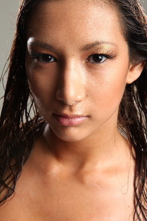 the wet look photo shoot i bronzed her up and used gold colors for her eyes