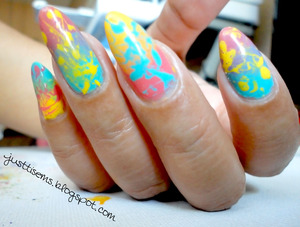 For a tutorial or to see what polish I used, you could check my blog http://justtisems.blogspot.com/2012/05/nails-done-oh-yeah-check_22.html