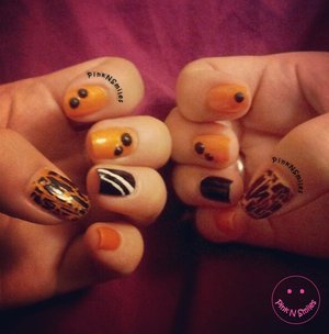 https://www.youtube.com/watch?v=yola-ruSq7I

Simple Halloween Nails with three colors:
black, orange, and white