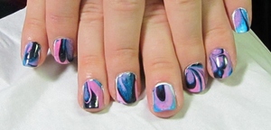 My First Water Marble Nails!

Blog post here:
http://rivuletsbeauty.blogspot.com/2012/01/notd-my-first-water-marble-nails.html