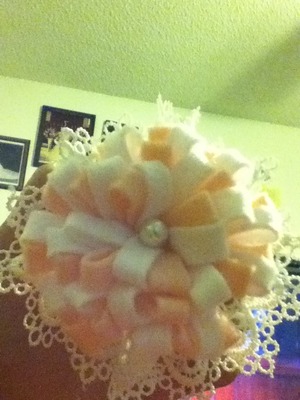 My mom made this super cute bow but still has to be on a clip or headband! :)