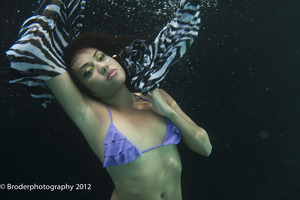 Underwater shoot with photographer William Broder. Yes, all of her makeup is waterproof!