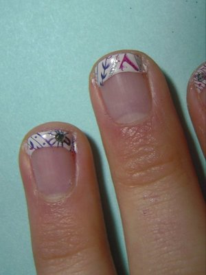 Red & Purple Flower Design over French Tip Nails.
