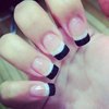 Traditional white French tips with black ends