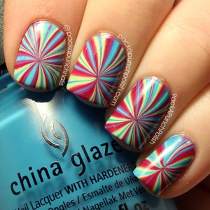 
A star burst water marble design!

Polishes Used:
China Glaze:
Traffic Jam
Spontaneous
Sunday Funday
Entourage

The white base polish is Sally Hansen Xtreme Wear White On.

Tutorial: http://youtu.be/Zfwke56qjBY

Full Blog Post: http://www.packapunchpolish.com/2013/03/star-burst-water-marble-nail-art.html