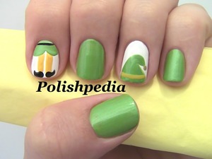 This design was inspired by the amazing Christmas movie Elf!  I love it.

Watch My Video Tutorial @ http://polishpedia.com/christmas-elf-nail-art.html