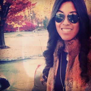 Styling: Michael Kors rabbit fur vest and Michael Kors sunglasses with Tiffany and Co. jewelry 