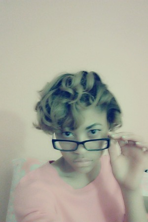 Curl City with a hint of attitude, sophistication and girliciousness.  
;-)