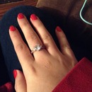 Red nails with a ring