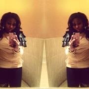 Tamia L.