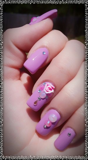 3D Pink Rose Bling On Purple Nails

Got the rose and pearly jems from Amazon. I love them so much when I got them, I ended up ordering more ??