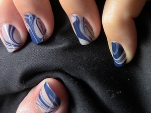 This was my first water marble nail art.  I loved doing this. You can see the complete video tutorial @ http//www.polishpedia.com/water-marble-nail-art.html