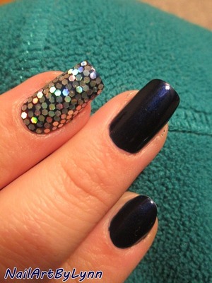 I saw this on beautylish a few days ago. Since I still have exams, I don't have a lot of time to do nail art. So I added flat rhinestones on a gorgeous navy blue colour. Very nice, elegant and super simple! Love it! visit my blog for more pictures: http://nailartbylynn.tumblr.com/post/41366127299