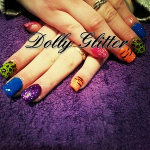 bright acrylics with painted nail art & glitter.