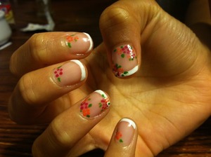 I did this manicure for my sister's friend for her graduation. She wanted something sweet and simple, but fun. The flowers are done to match her dress. I really like how this turned out, even though the French could be more clean. 