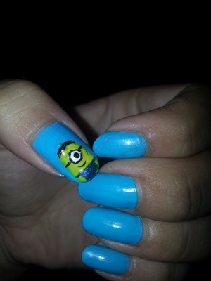 baby blue nails with a cute minion from despicable me!
