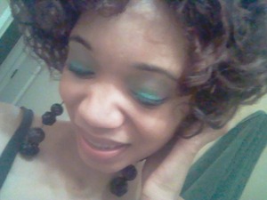 A MIX OF green,turquoise,purple,and silver..