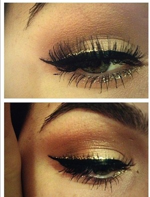 Gold glitter + winged eyeliner.
