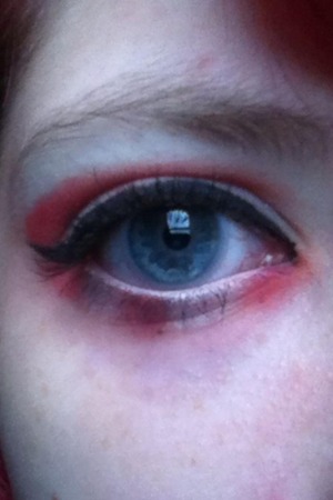 I used white and black eyeliner white eyeshadow and red blush cuz my red eyeshadow isn't dark enough