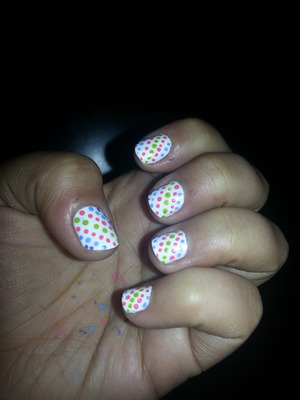 white base coat covered with fun colorful polkadots :)