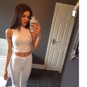 white high waisted jeans -top shop 
White lace crop too -newlook 
Chanel phone case -meltykiss 