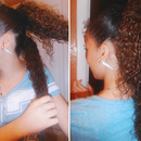 Curly pony tail.
