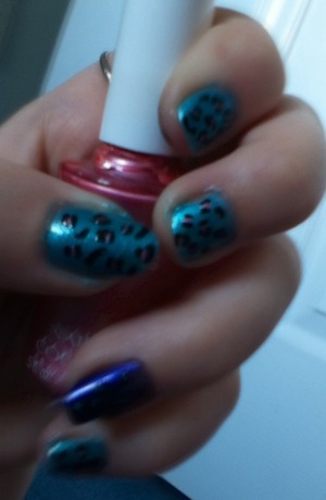 Teal/ pink with purple/ mint leopard print nails 💚