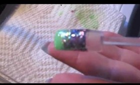 Purple glitter ,green lover nail design