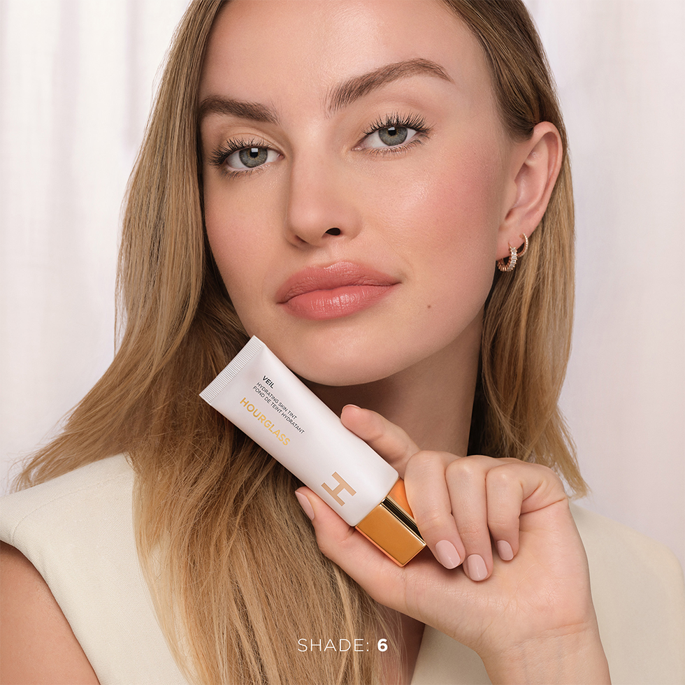 Hourglass Veil Hydrating Skin Tint model wearing shade 6