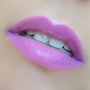 I mixed Belladonna, Nylon and Feathered OCC Lip tars to create a pastel pinky/lilac colour with more Feathered in the centre for a highlight, extra Belladonna at the outer corners and Benefit High Beam on the cupid's bow.

http://michtymaxx.blogspot.com.au