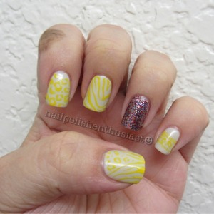 Avon Vintage Grey,Finger Paints Wicked Glitter, Konad Stamping Plates and random striping yellow 
