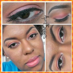 Light wash of orange in the crease and pink on the lid. Thin black liner. False lashes. Light pink lips.
