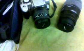Selling:Canon Rebel Xt (2 Lens) + FREE Accessories