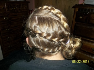 seashell side bun, i did to my dads girlfriends daughter. 