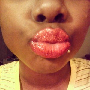 I first used a lip balm by Blistex Silk&shine also with SPF15
then i used revlon pink pout to pop out the color a bit 
also i used a hot Red glitter that i bought from my local beauty store 

makeup by me 

also chech me out on YOUTUBE @MellyRoman
