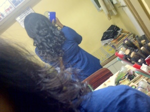 this is my hair after 2hrs of it bein rolled up.. i jus sprayed on a lil more elnette jus before i left to go out.. 