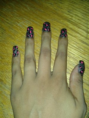 Gun Metal Glitter with pink and black leopard spots, topped with a gel coat
