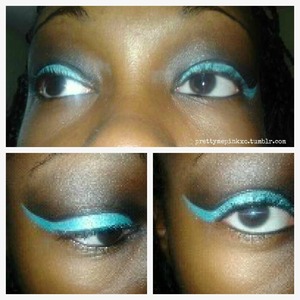 A turquoise and black cut crease