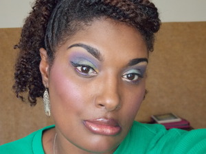 I love the color on a Peacocks Feathers and decide to do a Peacock inspired look