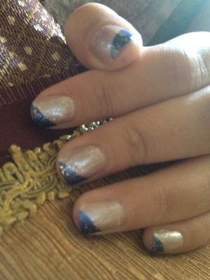 Silver base, midnight metallic blue half tip with glitter and top coat 