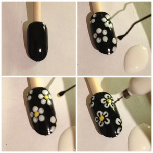 Simple, easy to do daisies & they're super cute. Use the end of a bobby pin dipped in white polish to dot 5 petals for easy daisy, use the other end to dot the centres with yellow, then a nail art pen or toothpick to draw the petals in :-) xoxo
follow me on Instagram: nailjam for more designs & tutorials 