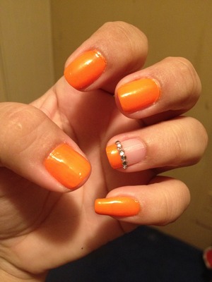 ONE OF MY FAVORITE SUMMER COLORS ... L.A COLORS NP503 TANGERINE ... SALLY HANSEN SUPER SHINE TOP COAT 

