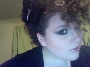 Experimenting with rag curls and a faux hawk. People thought I got a perm...won't be doing that again. 