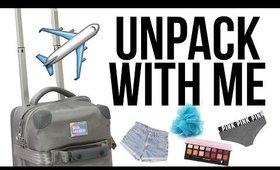 Unpack With Me: How I Pack a Carry-On for Travel  ▸ VICKYLOGAN