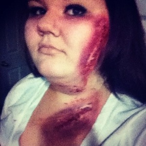 I threw a surprise party for one of my friends and I went as a zombie who was in a motorcycle accident! 